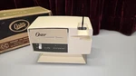 Vintage Oster Electric Knife Sharpener. Floating Split Wheel. Works Well.. Fixed Price $15.00.