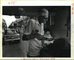 1988 Press Photo Stanley Braquet, Knife Sharpener His Van Outside Antoine's. Fixed Price $24.99.