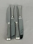 Christofle France Oasis Capricorne Stainless 9 1/4" Dinner Knives. Fixed Price $110.00.