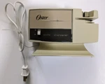 Vintage Oster Electric Knife Sharpener, No. 511-06A, Pre-owned. Fixed Price $19.99.