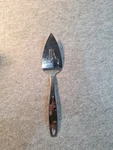 Oneida Stainless Steel 18/8 Flatware Pierced Server Notched Handle To Hang. Fixed Price $12.79.