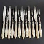 Antique English Silver Table Set Fork Knife Plated Mother Of Pearl. Fixed Price $385.00.