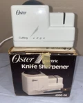 New Vintage Oster Cutting Edge Electric Knife Sharpener 4300-08 (TOTE3L). Fixed Price $14.99.