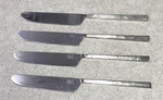 Set Of 4 Jason Design Inox Artisans Nascent Steel Handle Dinner Knives. Fixed Price $10.00.