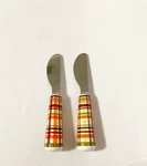 Boston Warehouse Plaid Cheese Spreader Knives Ceramic Stainless Set Of 2. Fixed Price $14.99.