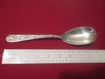 Silver Kirk & Son Repousse Sterling Serving Spoon Oval Shaped 3/8". Fixed Price $179.10.