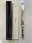 Ricci Argentieri - Bamboo Cake Knife New. Fixed Price $45.99.