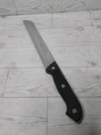 Slitzer Rostfrei 8" Bread Knife Stainless Steel Serrated Blade Black Handle. Fixed Price $12.99.