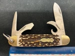 Uncle Henry 23UH Scout Camp Knife, Imitation Stag Handles. Fixed Price $29.99.