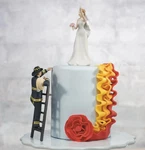 Weddingstar Cake Topper Fireman Groom & Bride Figurine New 6.75". Fixed Price $33.95.