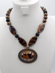 A88-CHUNKY Necklace Lucite Beads/black/amber Wild Animal Design 18.5"-21.5". Fixed Price $6.50.