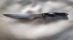 Cutco 1723 C76 Serrated Carving Knife Brown Orange Swirl Handle.. Fixed Price $22.99.