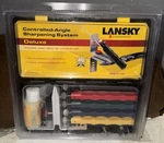 Lansky Deluxe 5-STONE Controlled-angle Precision Knife Sharpening System New. Fixed Price $67.93.