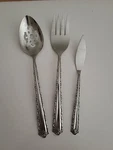 Oneida Deluxe Stainless Cherie Serving Fork, Slotted Spoon, Butter Spreader. Fixed Price $19.99.