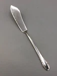 Enchantress By International Sterling Silver Master Butter Knife 7 1/8". Fixed Price $115.00.