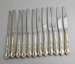1847 Rogers Bros Heritage Set Of 12 Dinner Knives Silverplate Silverware Knife. Fixed Price $34.95.