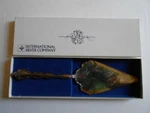 International Company, Silverplate 12" Server, No 104-081. Fixed Price $10.00.
