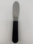 The Pampered Chef Hen On Nest Logo Serrated Spreader Black Handle Blade #1641. Fixed Price $9.99.