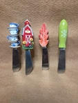 Lot Of 4 Cheese Butter Knives Spreaders Spring Summer Fall Winter Seasons. Fixed Price $12.95.