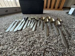 Oneida Stainless Steel Flatware Set - Assorted Pieces. Fixed Price $35.00.