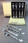 International Cocktail Fork Silverplate, Interlude Pattern 2 Box Set 8 Pc. Fixed Price $35.00.