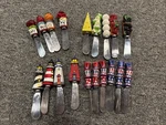 Lot 19 Boston Warehouse Cheese Butter Spreaders Knives Lighthouse American Flag. Fixed Price $29.99.