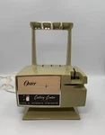Vtg Oster Cutlery Center Knife & Scissor Sharpener Stand Avocado Green-works. Fixed Price $18.99.