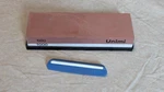 Unimi 600/1000 Grit Sharpening Stone With Angle Guides Non-slip Base. Fixed Price $33.99.