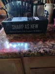 Shape As Narcissus Electric Knife Sharpener QN-M866-2. Fixed Price $29.99.