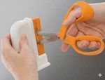 Fiskars Universal Desktop Scissors Sharpener. Fixed Price $15.88.