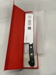 Zwilling Pro 7IN Rocking Santoku Knife Black Handle. Fixed Price $59.96.