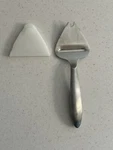 Pampered Chef Stainless Cheese Plane 2992. Fixed Price $5.00.