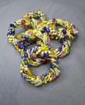 Set Of 6 Beaded Napkin Rings Multicolored Wire Strung Twisted Glass Beads PIER1. Fixed Price $35.84.