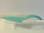Tupperware Cut Serve, Pie/cake Server Serrated Edge Mint Green 12 5193A. Fixed Price $11.99.